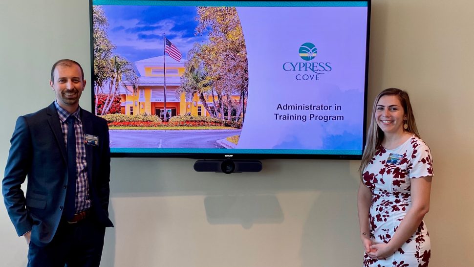 From left, The Lodge at Cypress Cove Administrator Matt Lessig is joined by Tily Sayeh who has been accepted and approved to become the skilled nursing home and rehabilitation facility’s first AIT intern (Administrator in Training).  The program, approved by the Florida Board of Nursing Home Administrators, begins its inaugural start on March 1.  